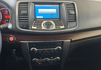 Подержанный автомобиль Nissan Teana 2010 года (14 фото)