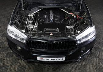 Подержанный автомобиль BMW X5 2014 года (9 фото)