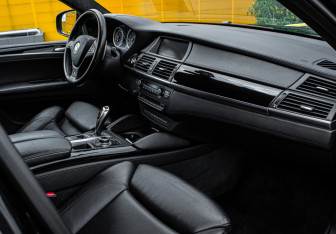Подержанный автомобиль BMW X6 M 2013 года (7 фото)