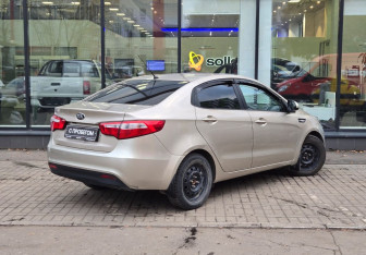 Подержанный автомобиль Kia Rio Sedan 2014 года (8 фото)