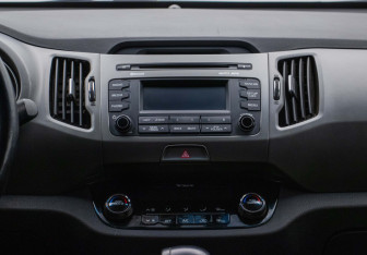 Подержанный автомобиль Kia Sportage 2014 года (14 фото)