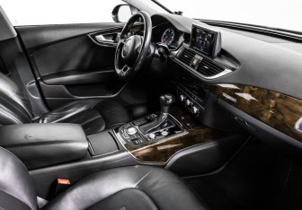 Подержанный автомобиль Audi A7 2014 года (9 фото)