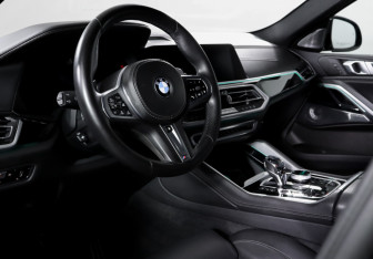 Подержанный автомобиль BMW X6 2021 года (14 фото)