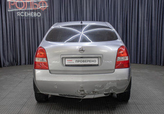 Подержанный автомобиль Nissan Primera Sedan 2003 года (6 фото)