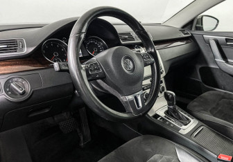 Подержанный автомобиль Volkswagen Passat Sedan 2012 года (13 фото)