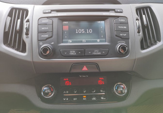 Подержанный автомобиль Kia Sportage 2014 года (14 фото)