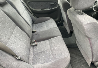 Подержанный автомобиль Kia Spectra Sedan 2006 года (11 фото)