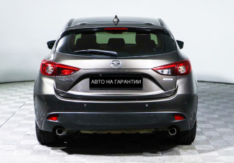 Подержанный автомобиль Mazda 3 Hatchback 2013 года (4 фото)