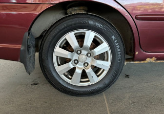 Подержанный автомобиль Kia Spectra Sedan 2006 года (16 фото)