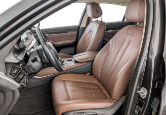 Подержанный автомобиль BMW X6 2018 года (20 фото)