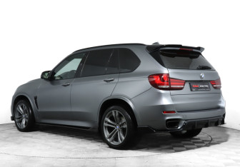 Подержанный автомобиль BMW X5 2014 года (7 фото)