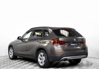 Подержанный автомобиль BMW X1 2013 года (7 фото)