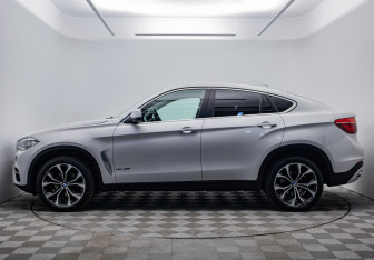 Подержанный автомобиль BMW X6 2015 года (2 фото)