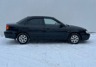 Подержанный автомобиль Kia Spectra Sedan 2007 года (4 фото)