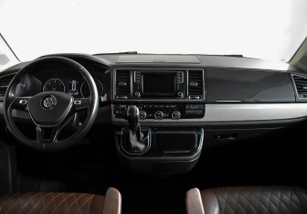 Подержанный автомобиль Volkswagen Multivan 2016 года (11 фото)