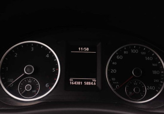 Подержанный автомобиль Volkswagen Tiguan 2010 года (12 фото)