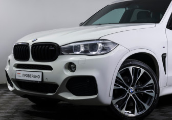 Подержанный автомобиль BMW X5 2014 года (21 фото)