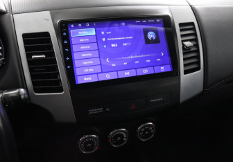 Подержанный автомобиль Mitsubishi Outlander 2010 года (10 фото)