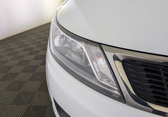 Подержанный автомобиль Kia Rio Hatchback 2014 года (11 фото)