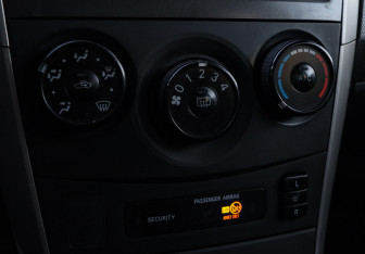 Подержанный автомобиль Toyota Corolla Sedan 2007 года (14 фото)