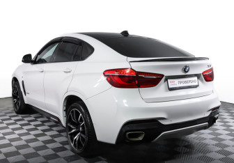 Подержанный автомобиль BMW X6 2018 года (7 фото)