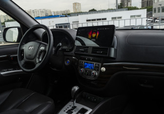 Подержанный автомобиль Hyundai Santa Fe 2011 года (14 фото)