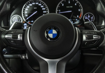 Подержанный автомобиль BMW X6 2018 года (12 фото)