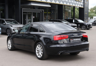 Подержанный автомобиль Audi A6 Sedan 2014 года (7 фото)