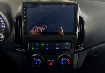Подержанный автомобиль Hyundai i30 Hatchback 2010 года (13 фото)