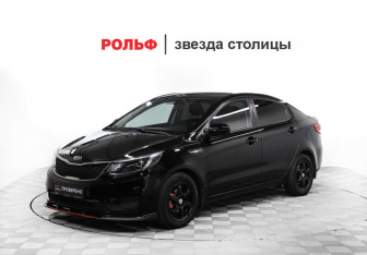 Подержанный автомобиль Kia Rio Sedan 2015 года (24 фото)