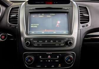 Подержанный автомобиль Kia Sorento 2015 года (15 фото)