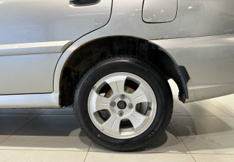 Подержанный автомобиль Kia Rio Wagon 2005 года (18 фото)