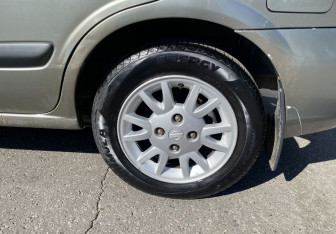 Подержанный автомобиль Nissan Almera Hatchback 2005 года (12 фото)