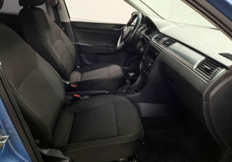 Подержанный автомобиль Skoda Rapid Liftback 2014 года (9 фото)