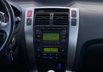 Подержанный автомобиль Hyundai Tucson 2008 года (13 фото)