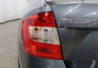 Подержанный автомобиль Skoda Rapid Liftback 2014 года (25 фото)