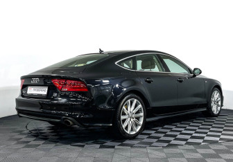 Подержанный автомобиль Audi A7 2012 года (5 фото)