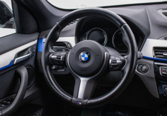 Подержанный автомобиль BMW X1 2018 года (15 фото)