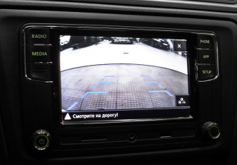 Подержанный автомобиль Skoda Rapid Liftback 2014 года (19 фото)