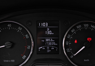 Подержанный автомобиль Skoda Rapid Liftback 2014 года (12 фото)