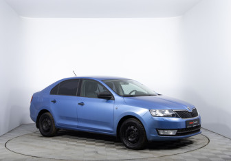Подержанный автомобиль Skoda Rapid Liftback 2014 года (3 фото)