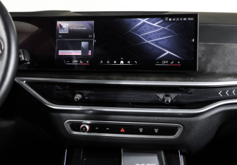 Подержанный автомобиль BMW X5 2024 года (14 фото)