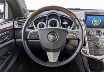 Подержанный автомобиль Cadillac SRX 2011 года (14 фото)