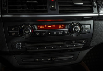 Подержанный автомобиль BMW X6 2009 года (14 фото)