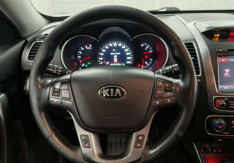 Подержанный автомобиль Kia Sorento 2014 года (14 фото)