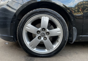 Подержанный автомобиль Kia Cerato Sedan 2012 года (9 фото)
