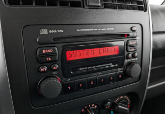 Подержанный автомобиль Suzuki Jimny 2011 года (21 фото)