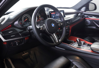 Подержанный автомобиль BMW X6 M 2017 года (15 фото)