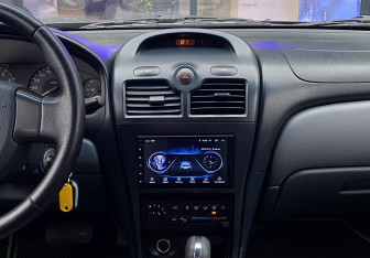 Подержанный автомобиль Nissan Almera Classic 2006 года (13 фото)