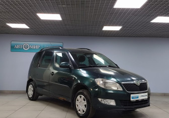 Подержанный автомобиль Skoda Roomster 2011 года (3 фото)
